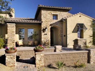 DesignLens62_beige-stone-house-with-textured-cinder-block-wall_s4x3.jpg.rend.hgtvcom.1280.960.jpeg